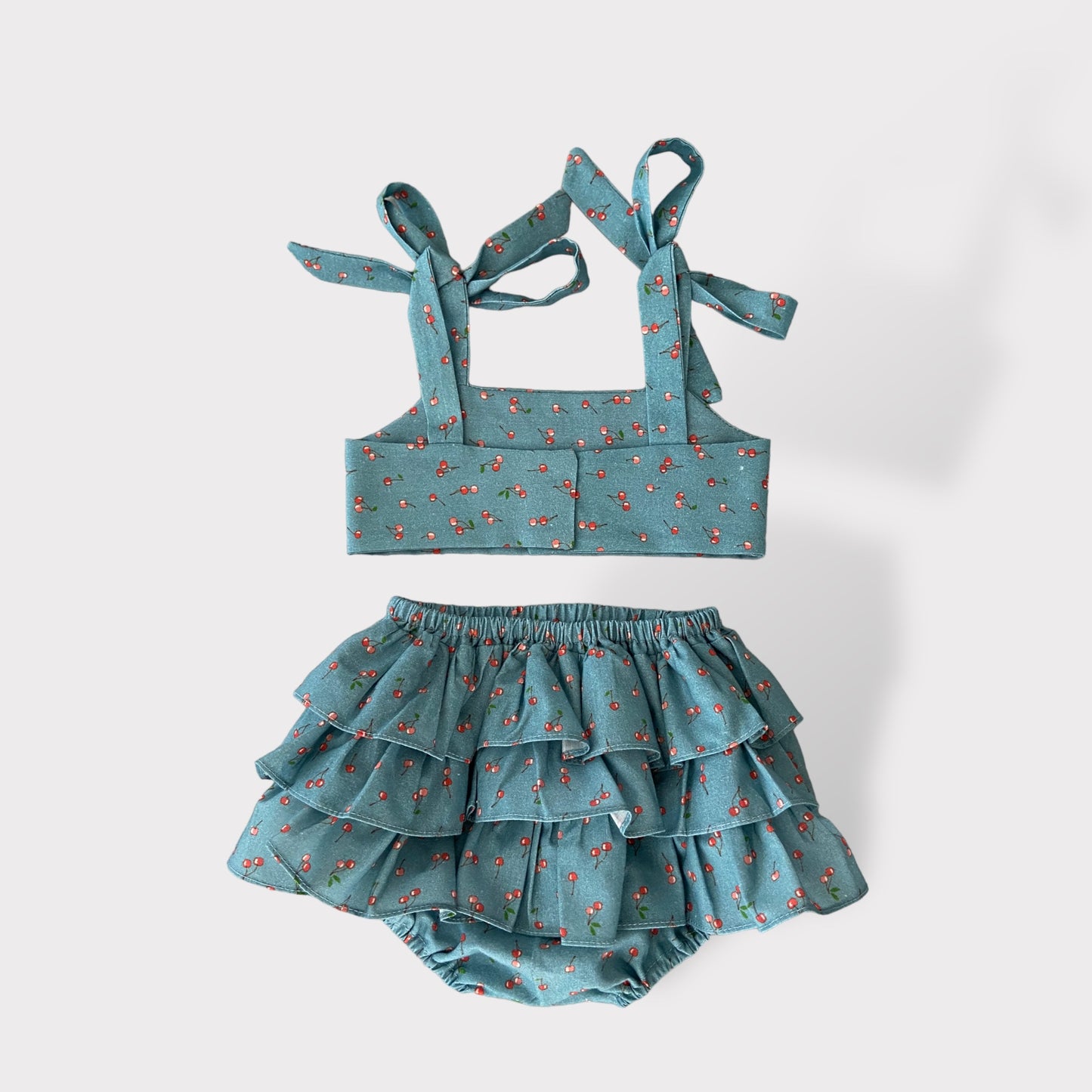 Retro del costume mare per neonato con ciliegie