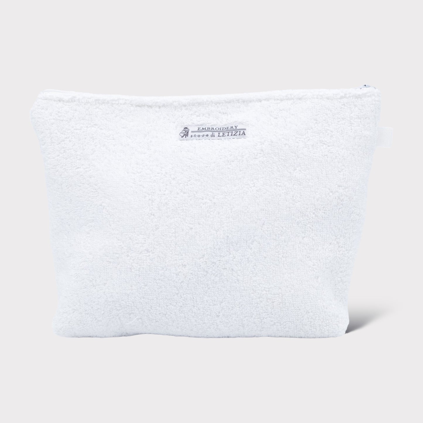 Trousse de toilette en éponge blanche avec ours brodé