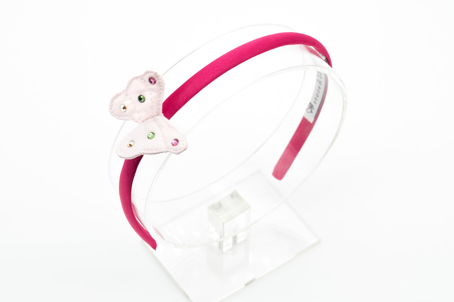 Diadema fucsia con farfalla piccola