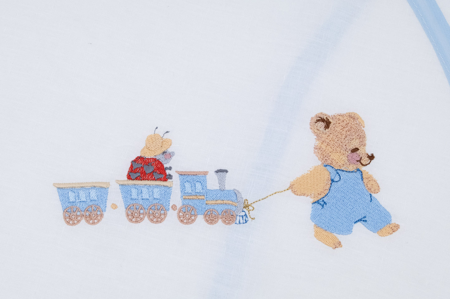 Star sleeping bag with teddy bear, ladybug and embroidered train
